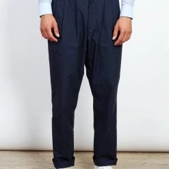 PUMA Shop -PUMA Shop eigil light wide cut summer trousers navy 584496